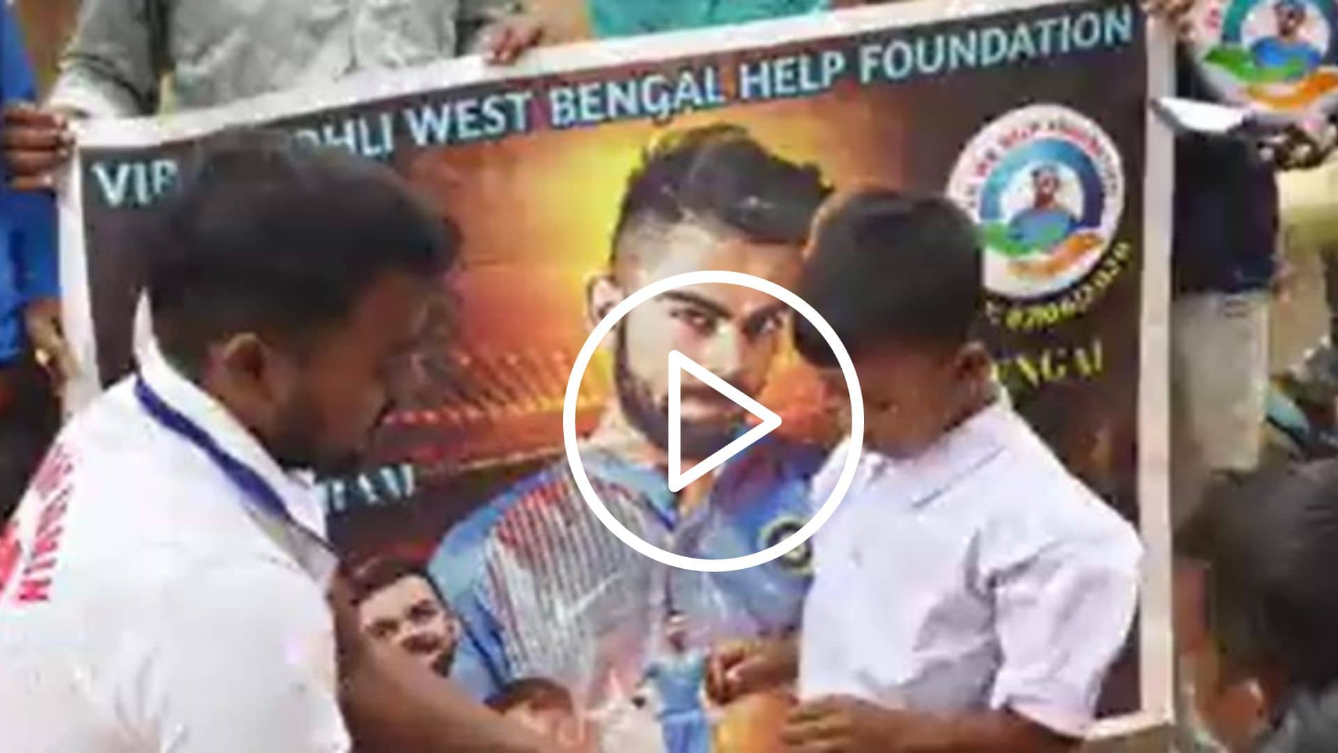 [Watch] Virat Kohli Fans Distribute Clothes To Needy Children In West Bengal